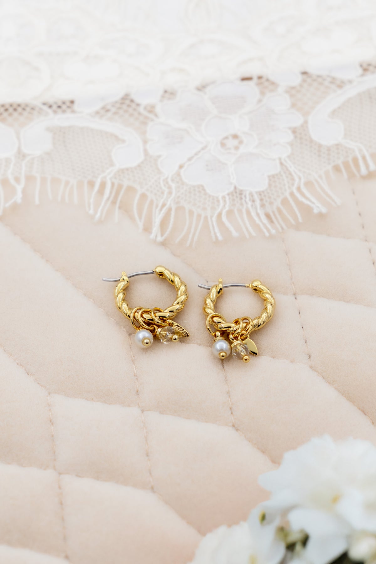Lucente twisted charm hoops